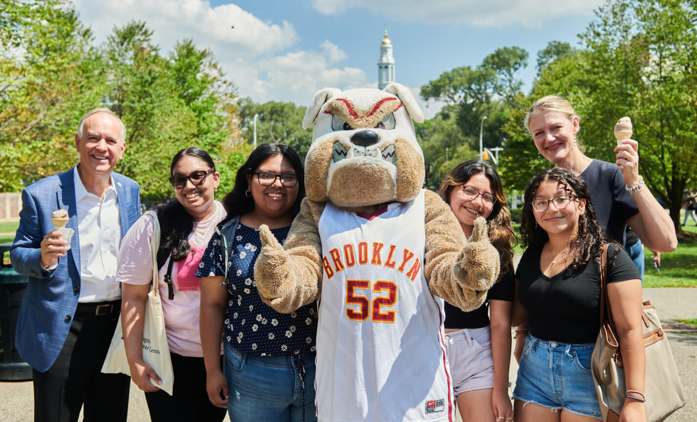 Chancellor Félix V. Matos Rodríguez with CUNY students and moscot