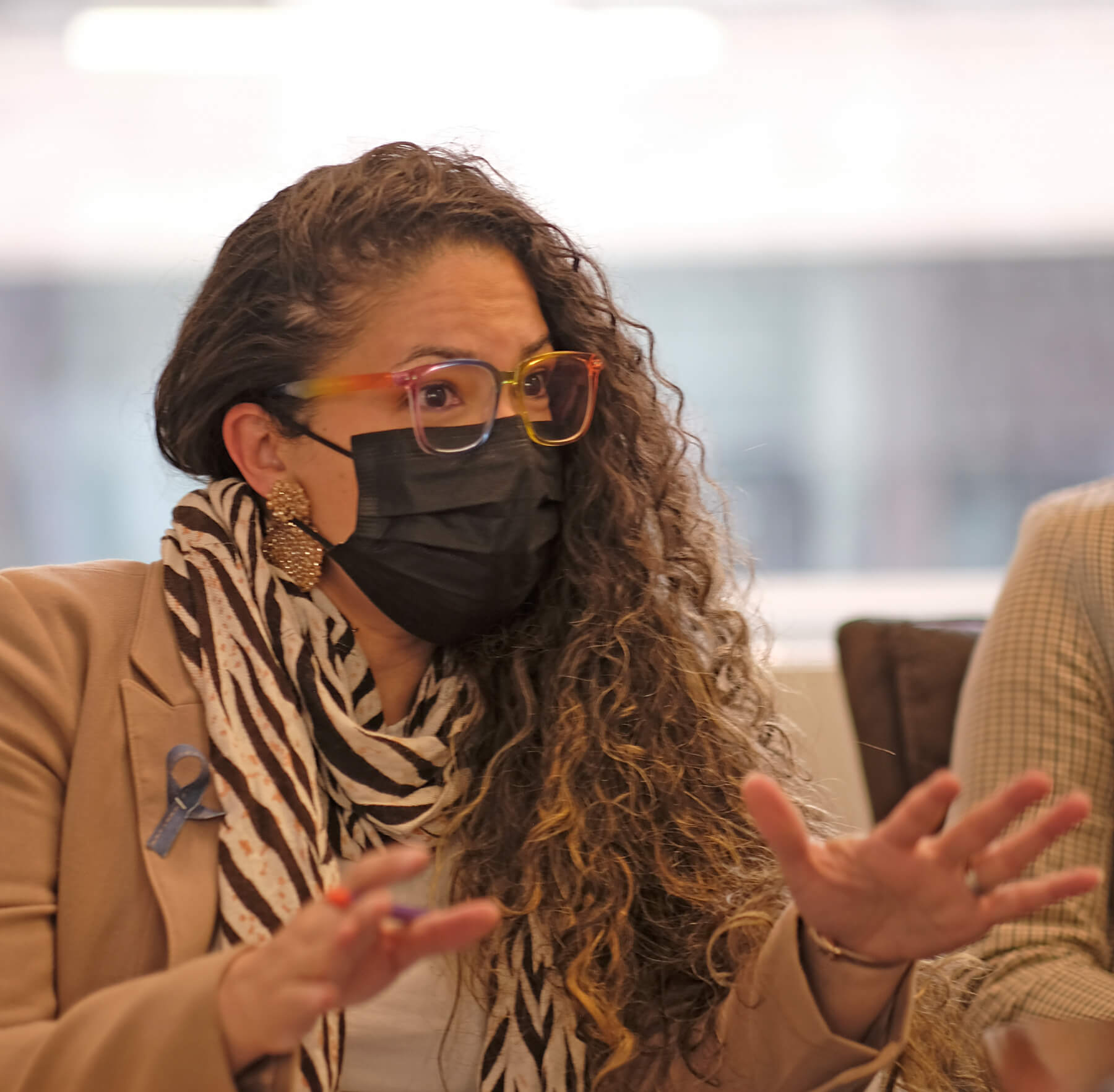 Director Victoria Romero in face mask.